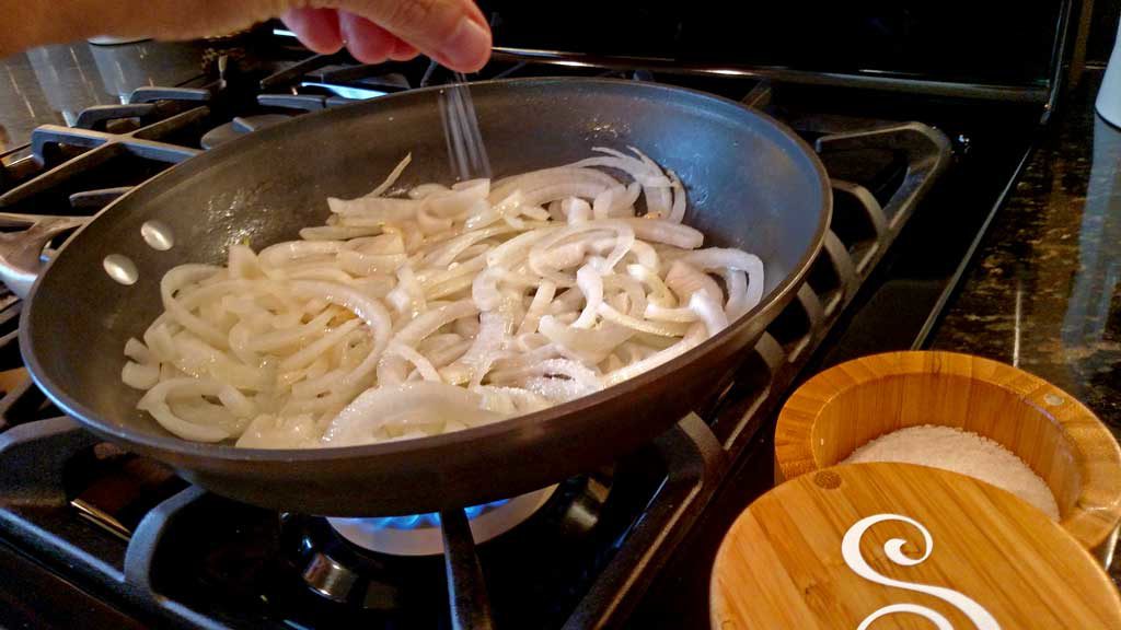 onions cooking in pan