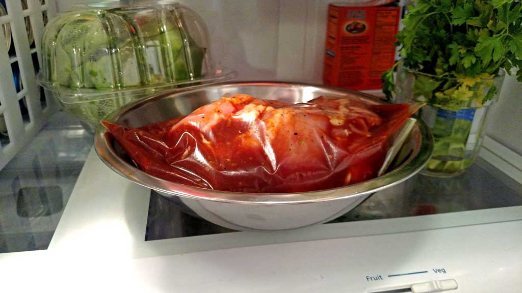 Orange Ginger Chicken marinating in refrigerator