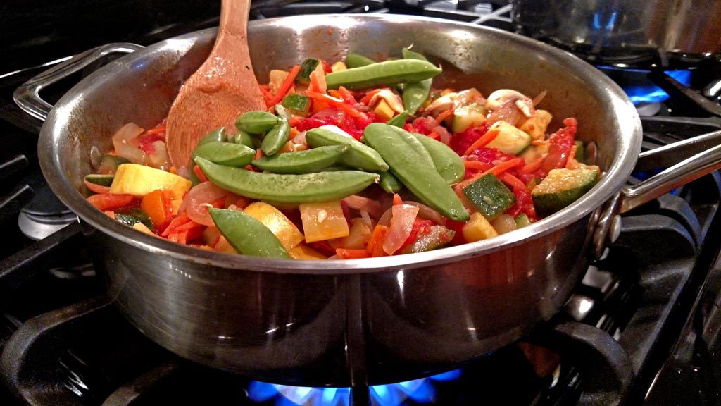 vegetables cooking in skillet