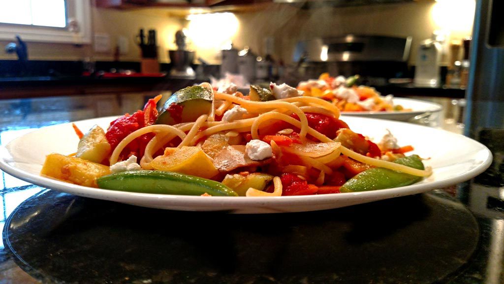 steaming plate of pasta primavera
