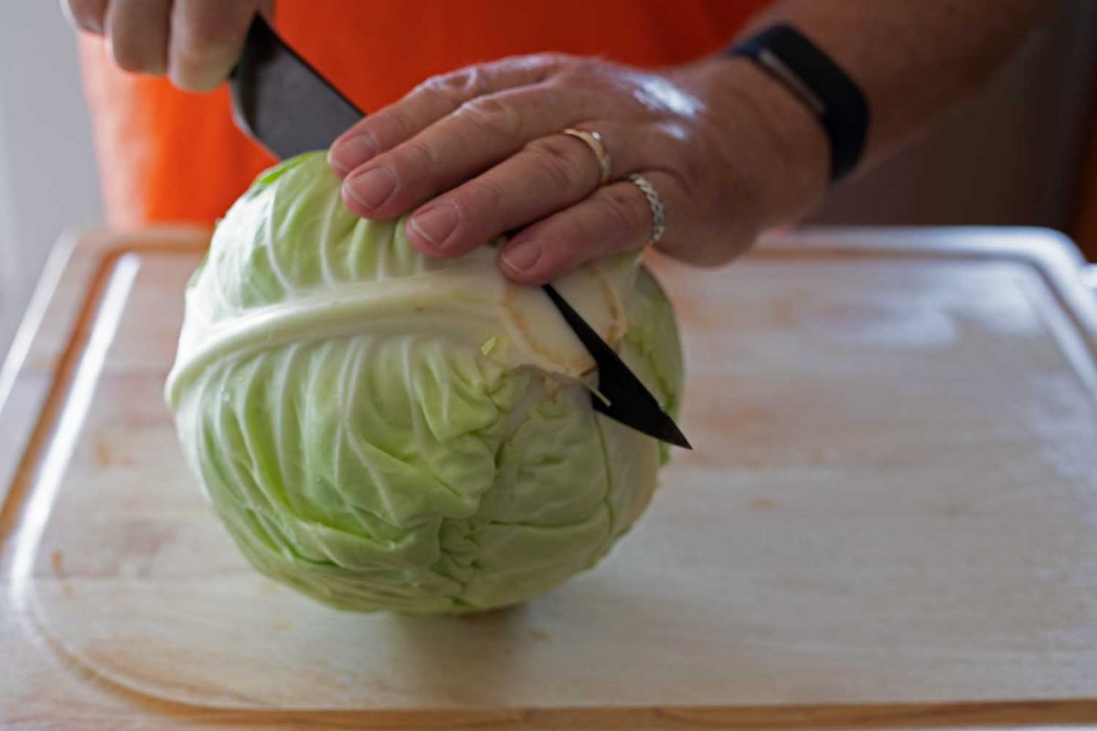 cutting cabbage in half