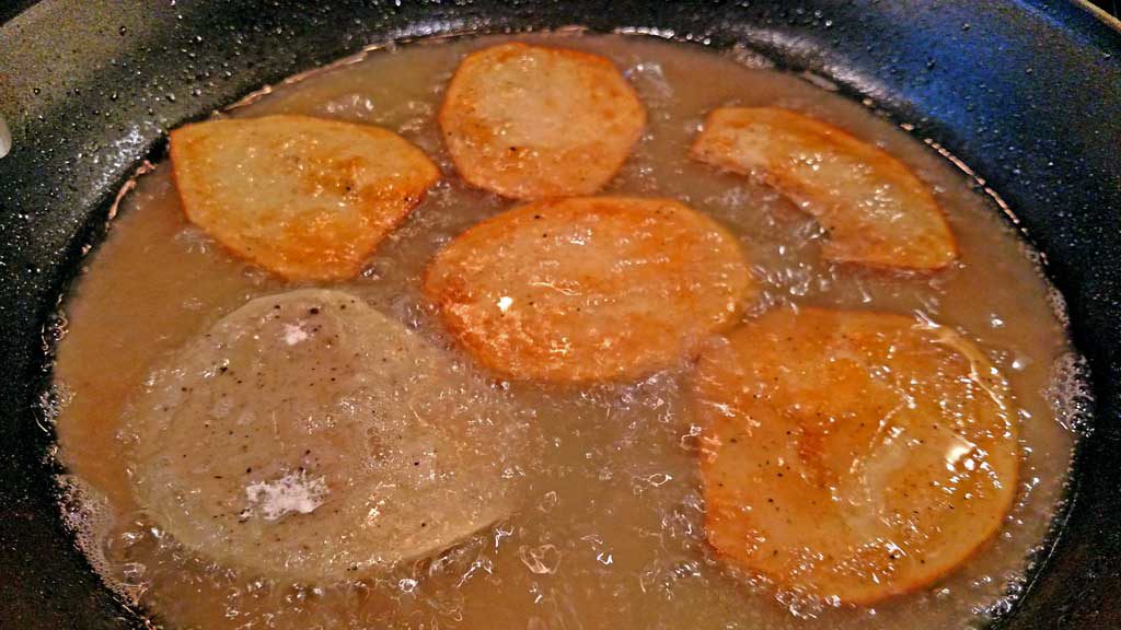 Potatoes are one of the most versatile vegetables on this planet. These battered potatoes are simple, delicious and easy to prepare. | TheMountainKitchen.com