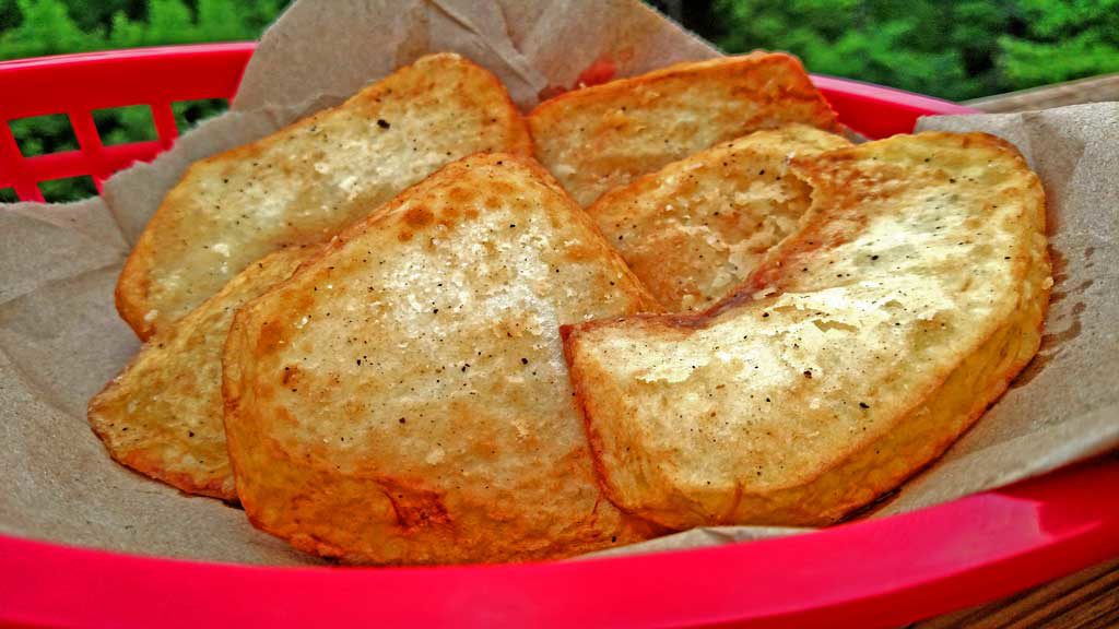 Potatoes are one of the most versatile vegetables on this planet. These battered potatoes are simple, delicious and easy to prepare. | TheMountainKitchen.com