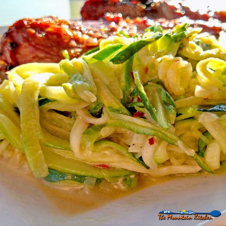 These garlic goat cheese zucchini noodles are a great low-carb option. Creamy, garlicky noodles with a hint of spice. A perfect side dish to any meal. | TheMountainKitchen.com
