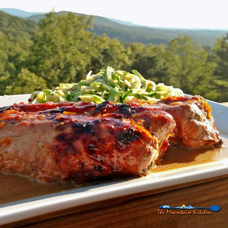 Sriracha orange marmalade pork tenderloin with a spicy sriracha orange marmalade sauce that has just the right amount of spice, tang and sweetness. | TheMountainKitchen.com