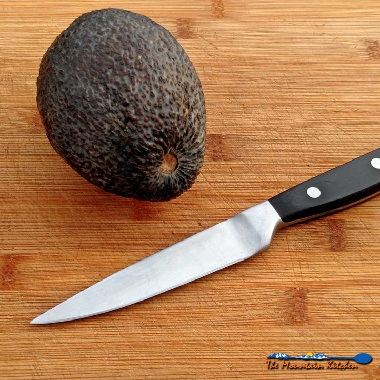 Slicing an avocado is tricky if you don't know a few simple tips to keep them from squishing around. Learn how to cut peel and slice an avocado. | TheMountainKitchen.com
