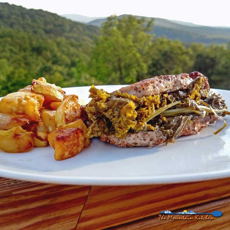 This great southern style Sunday supper may take a little time, but these Kale Stuffed Pork Chops have the potential to change the minds of green-haters. | TheMountainKitchen.com
