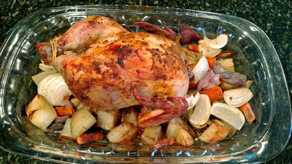 Leap into Fall with this roast chicken and vegetables. Moist and succulent, this chicken is enhanced with a savory herb butter and vegetables. | TheMountainKitchen.com