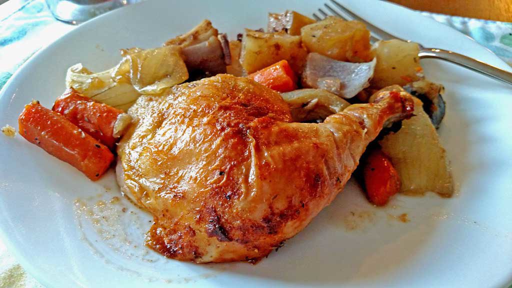 Leap into Fall with this roast chicken and vegetables. Moist and succulent, this chicken is enhanced with a savory herb butter and vegetables. | TheMountainKitchen.com