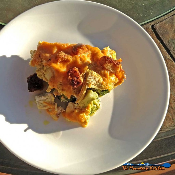 Curry Chicken broccoli casserole topped with a curry flavored sauce with lemon juice, topped with cheddar cheese and crunchy garlic flavored croutons. | TheMountainKitchen.com