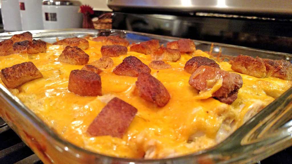 Curry Chicken broccoli casserole topped with a curry flavored sauce with lemon juice, topped with cheddar cheese and crunchy garlic flavored croutons. | TheMountainKitchen.com