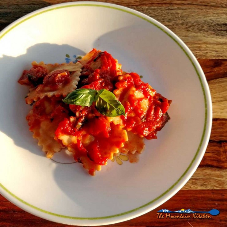 This homemade tomato sauce is made with San Marzano tomatoes, a hearty red wine, and lots of fresh summer basil; the beginning of countless Italian dishes. | TheMountainKitchen.com