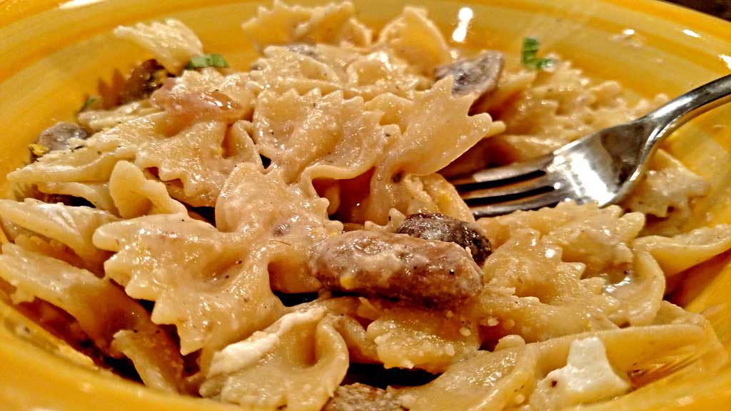 Mushroom Goat Cheese Farfalle in a dish ready to eat