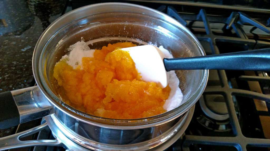 melting the sugar into egg yolks in double-boiler