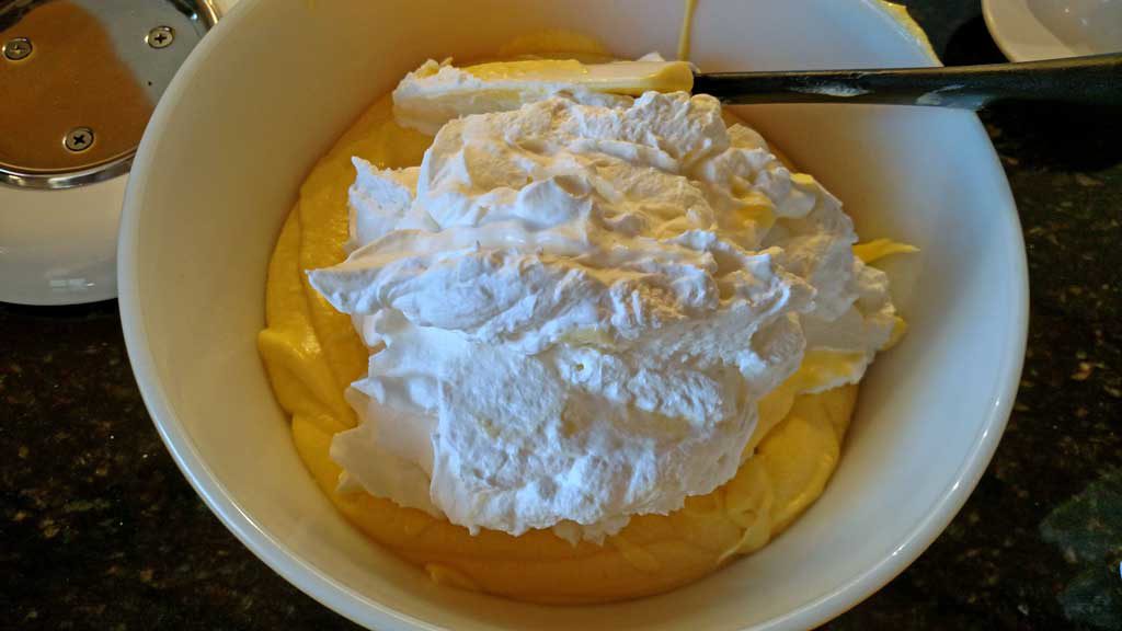 addition of whipped cream into yolk mixture