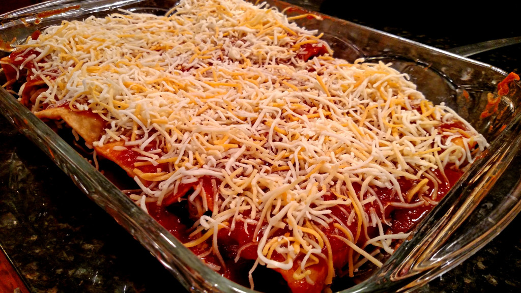 enchiladas coated with cheese