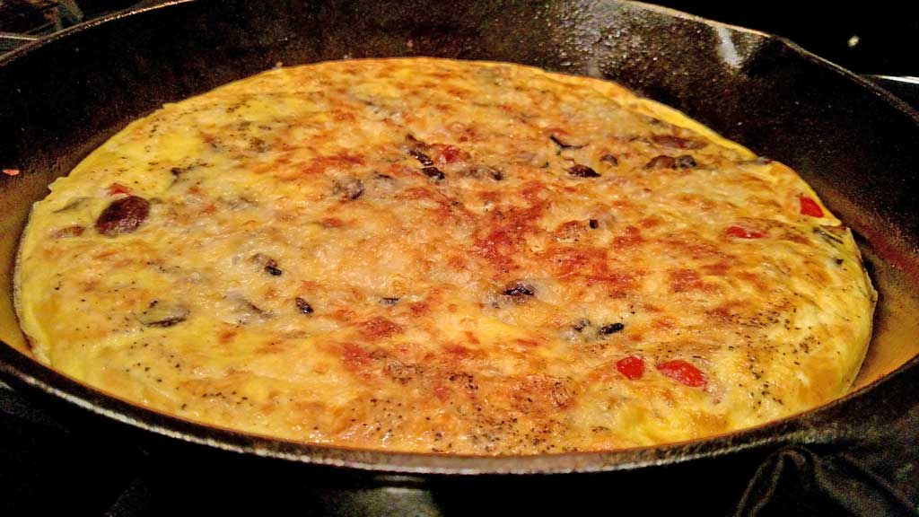 vegetable fritatta in pan cooling