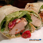 Chicken Caesar Wraps | These Chicken Caesar Wraps have juicy chicken tenders, wrapped inside a tortilla with crispy romaine lettuce, cherry tomatoes, feta and parmesan cheese, then dressed with your favorite Caesar dressing with crumbled pepperonis for extra flavor. | TheMountainKitchen.com