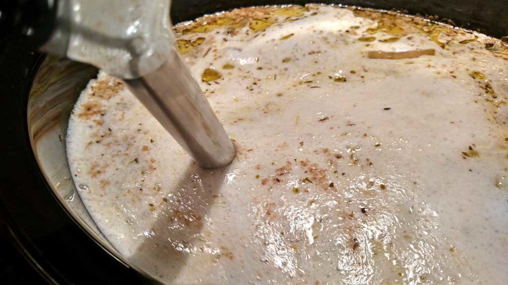 blending soup with immersion blender