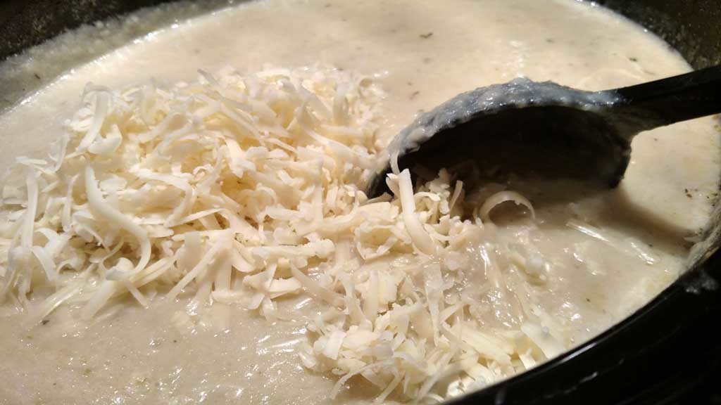 stirring in cheese