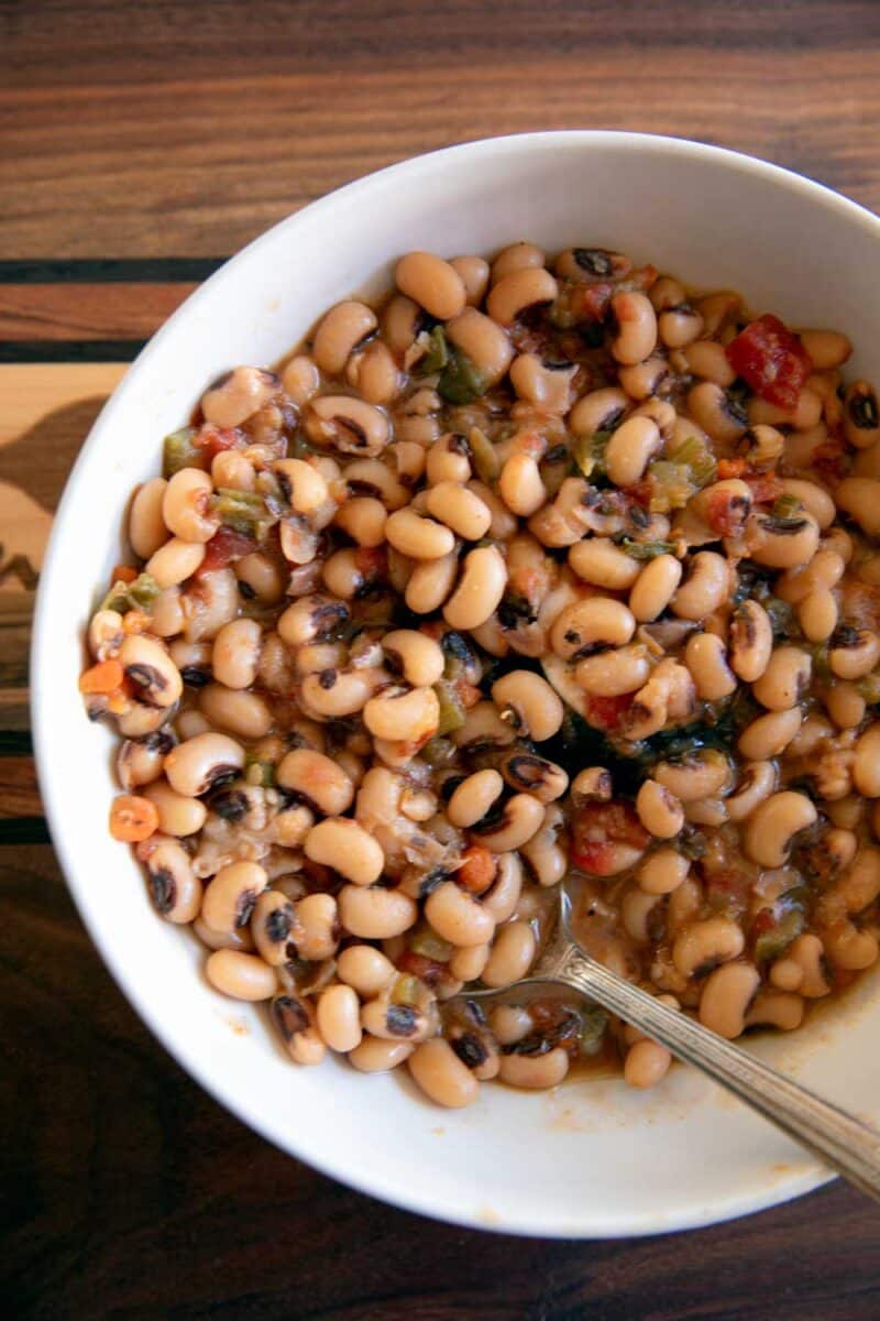 hoppin john ready to eat in bowl with spoon