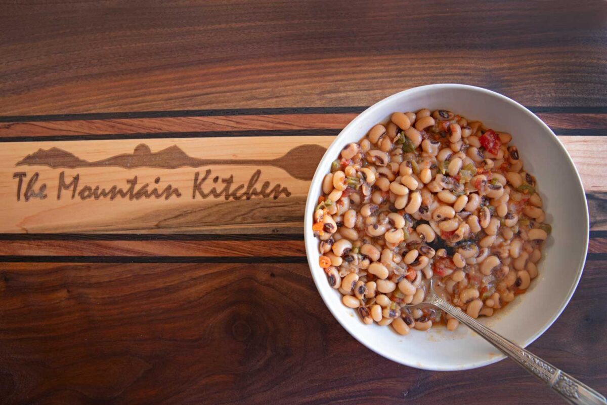 hoppin' john in bowl with spoon