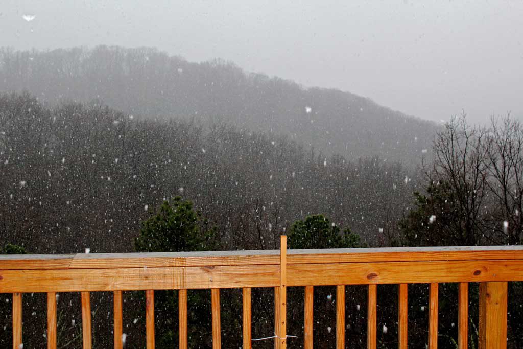 snow falling from deck