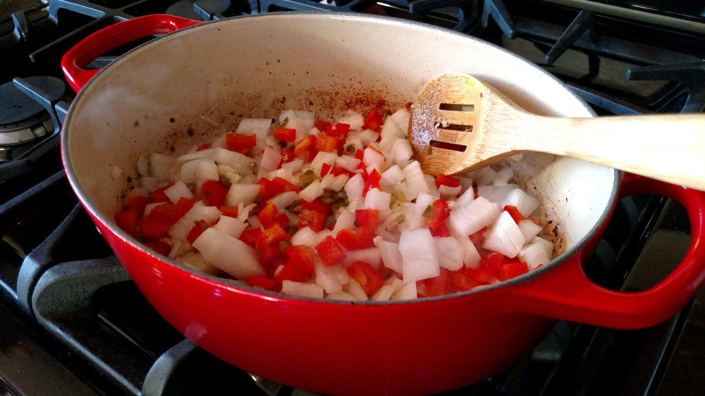 peppers and onions added to pot