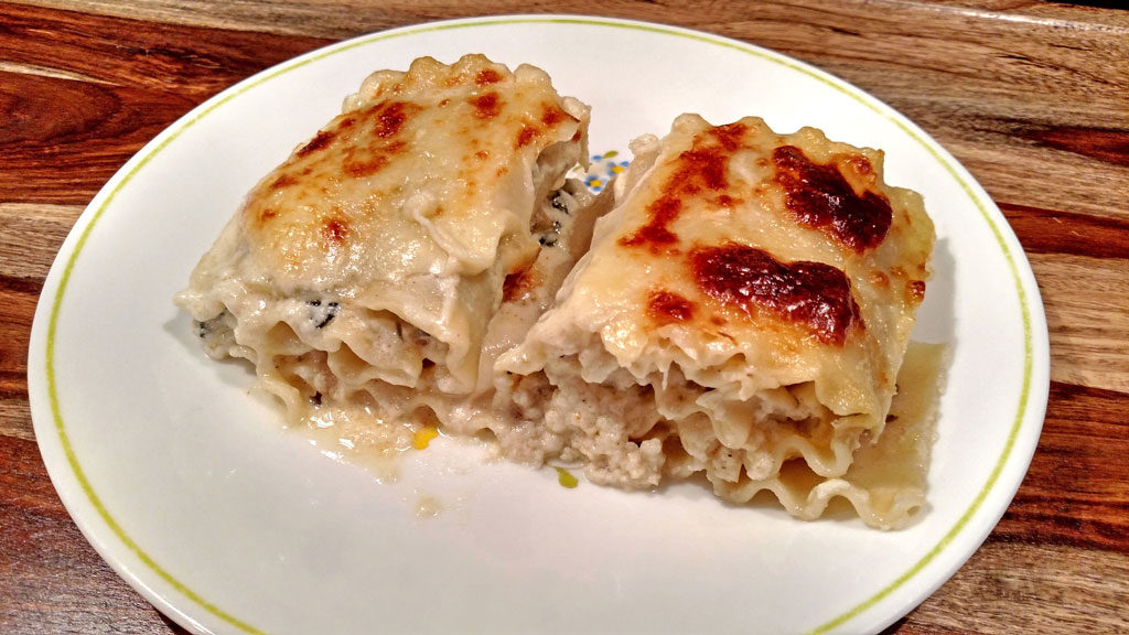 Spinach Artichoke and Mushroom Rollatini on plate