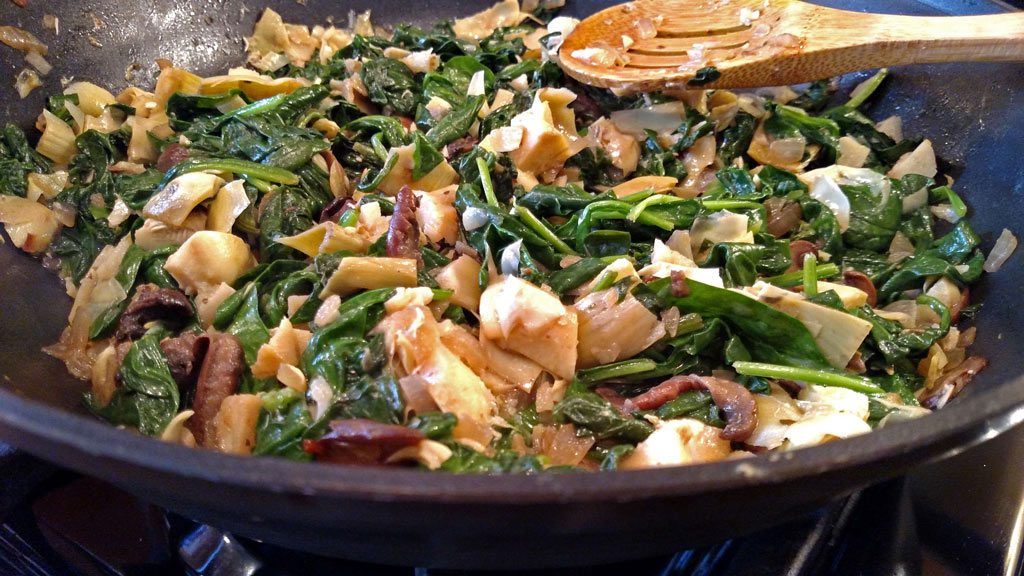 cooking vegetables in pan