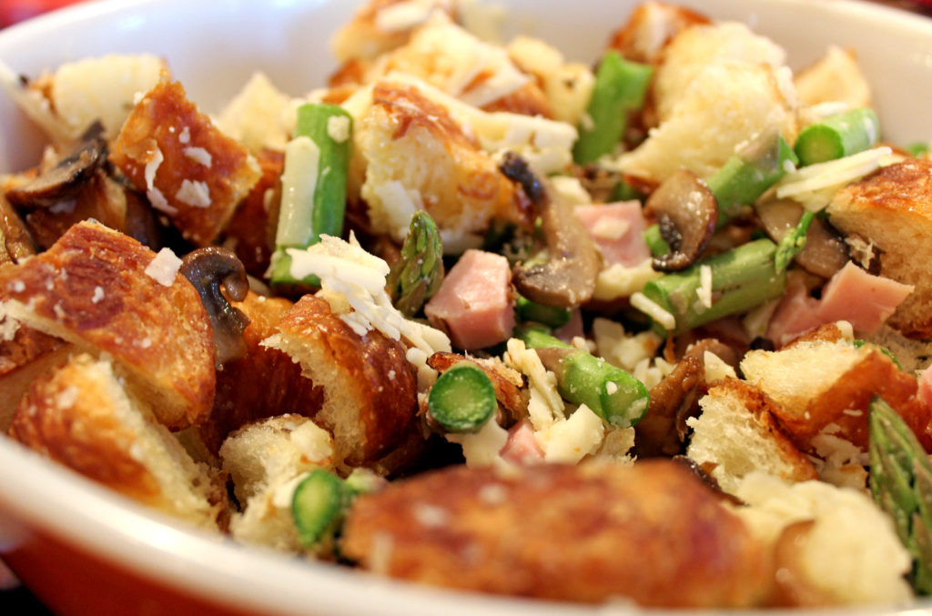 Ham, Asparagus, and Mushroom Bread Pudding | This is a savory bread pudding loaded with smoked Virginia ham, fresh asparagus, portobello mushrooms, Gruyere cheese & croissants, soaked in rich custard. | TheMountainKitchen.com