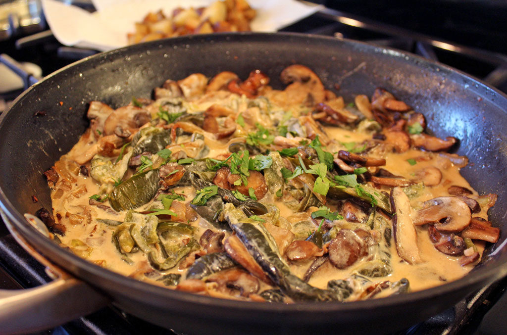 Tacos, filled with roasted poblano peppers, sauteed mushrooms and onions with country-style skillet potatoes served in a cream sauce with a hint of lime. | TheMountainKitchen.com