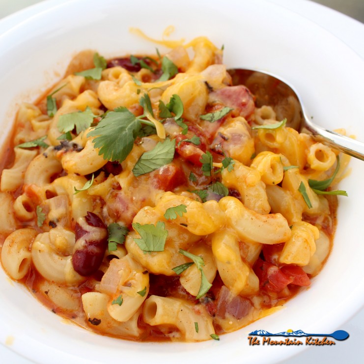 Cajun chili mac in bowl with spoon