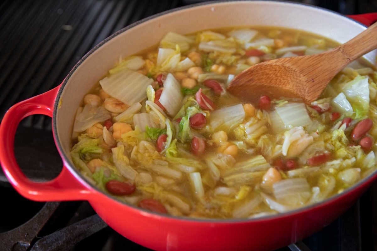 pot of napa cabbage and bean soup on stove