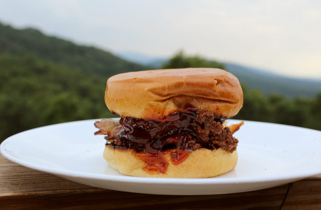 burger with sauce and mountain view