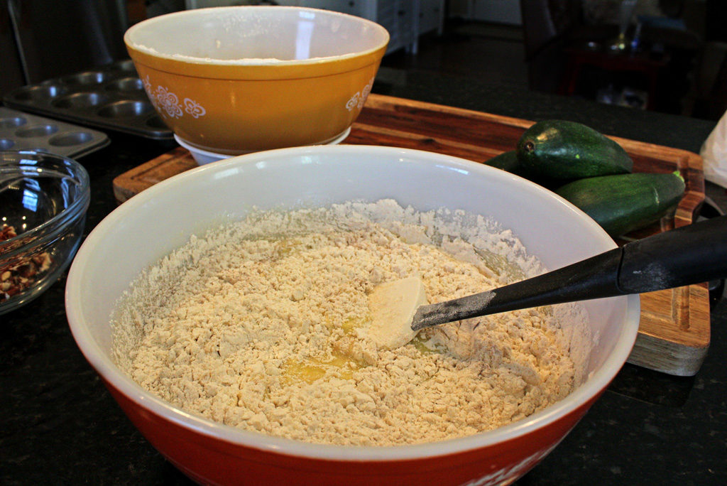 zucchini muffin batter in bowl