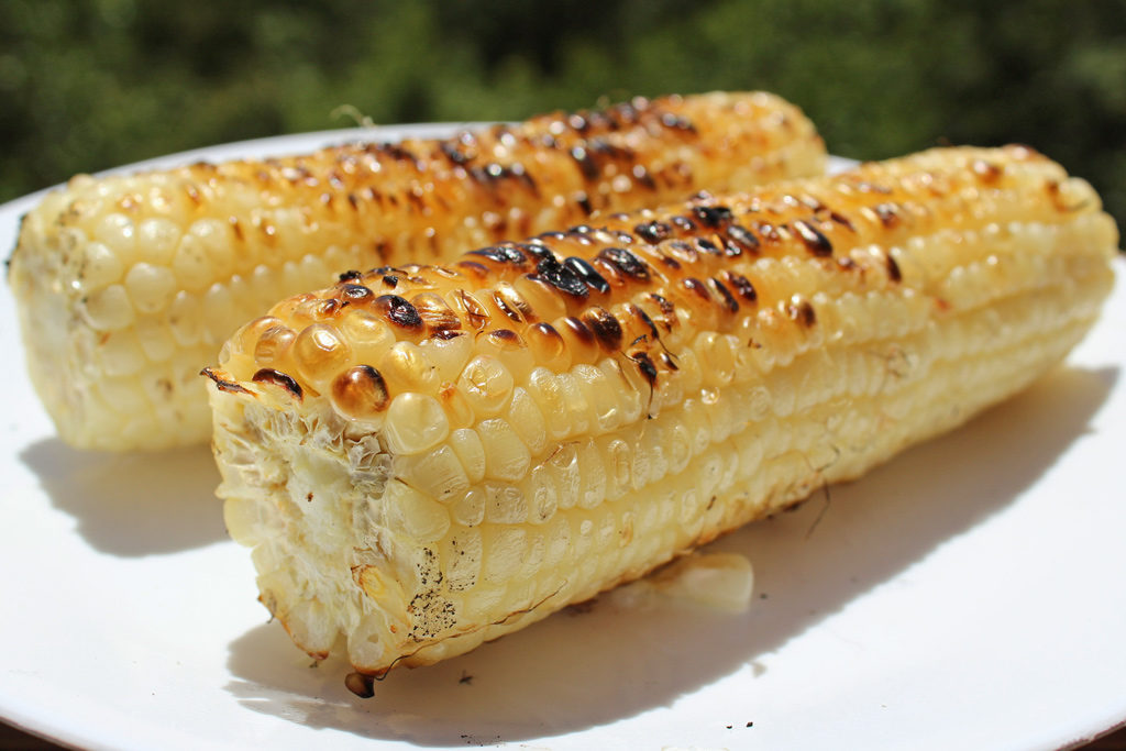 grilled corn on plate