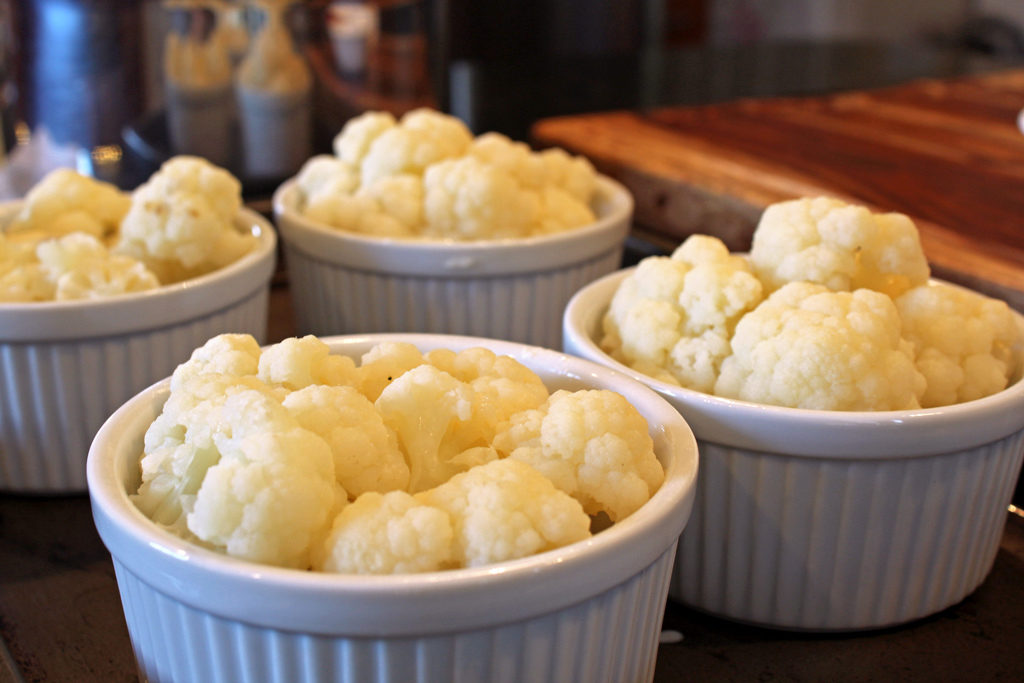 cauliflower in ramekin with cheese sauce