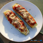 Sweet Italian Sausage Stuffed Zucchini Boats on plate