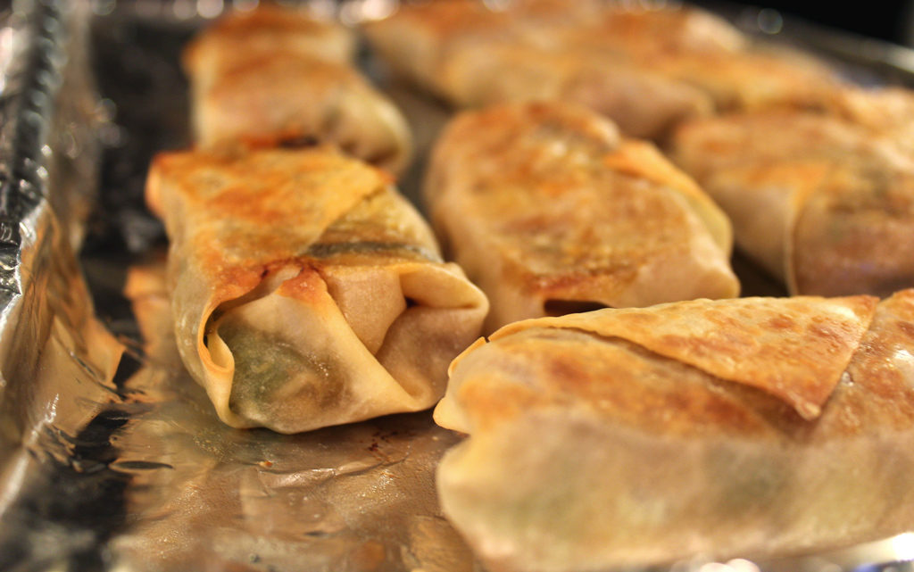 These baked vegetable egg rolls are baked, not fried and loaded with fresh vegetables, seasoned with ginger, garlic and soy sauce, with a tasty honey sesame dipping sauce. | TheMountainKitchen.com