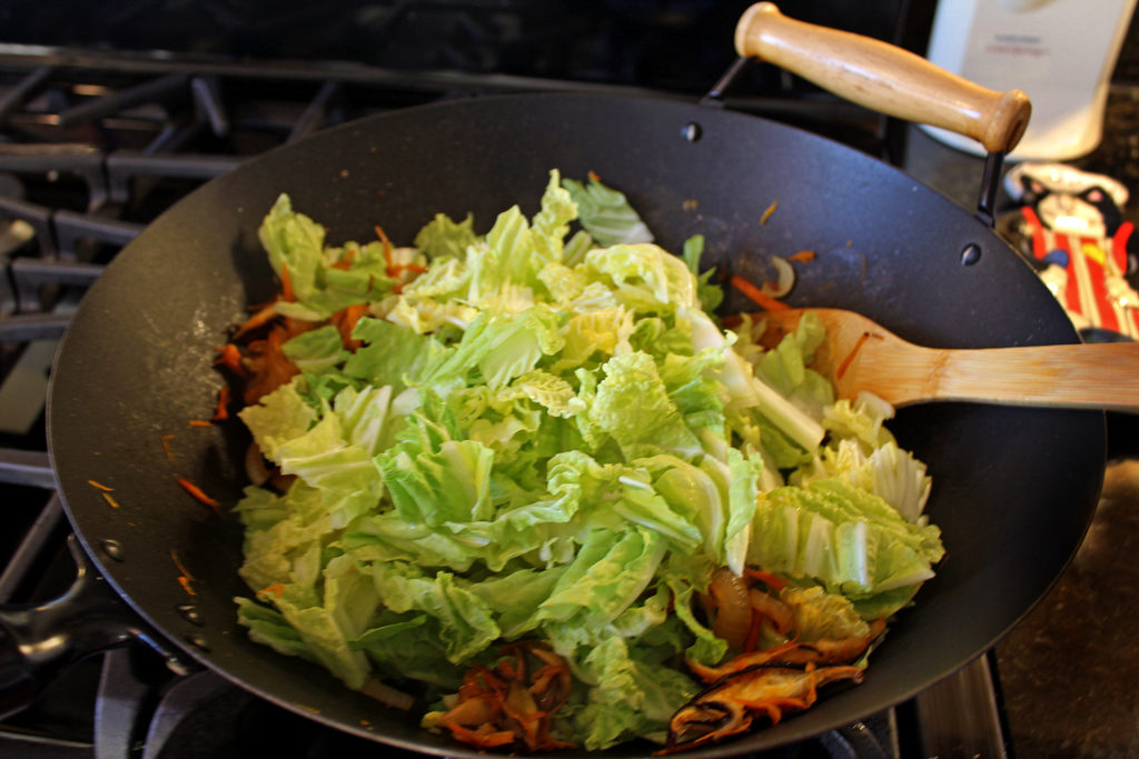 the filling cooking inside a wok