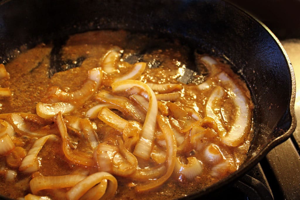 onions cooking in pan