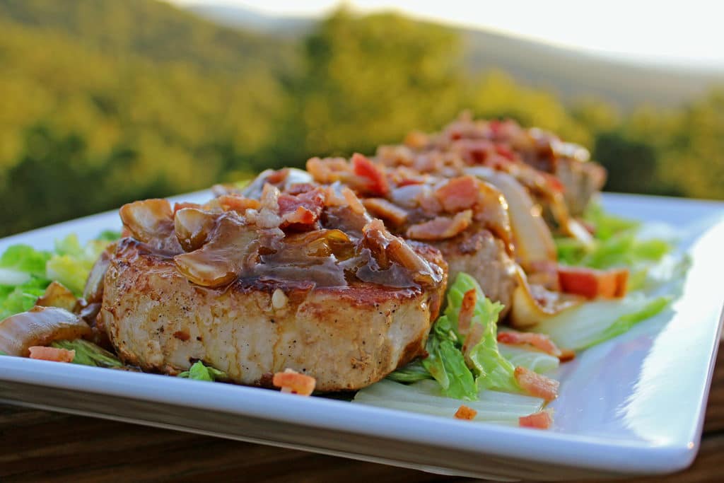 pan seared pork chops on serving plate