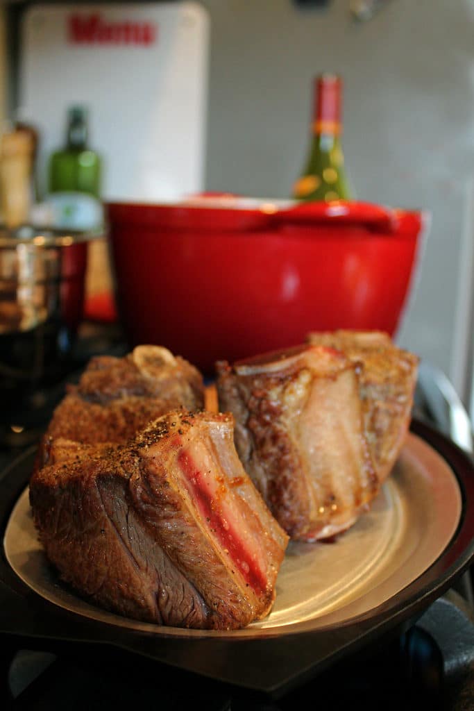 browned short ribs next to pot
