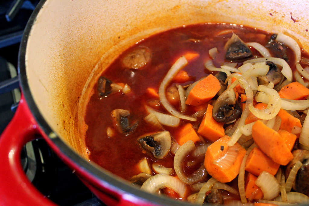 Red Wine Braised Beef Short ribs are slow cooked and braised in a thick hearty sauce of red wine and herb seasoned vegetables. | TheMountainKitchen.com