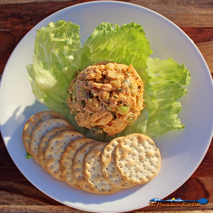 roasted chicken salad on plate with lettuce and crackers