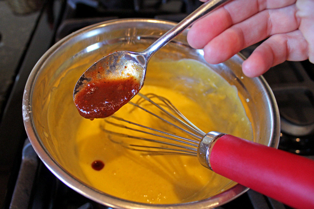 adding adobo sauce to Hollandaise sauce