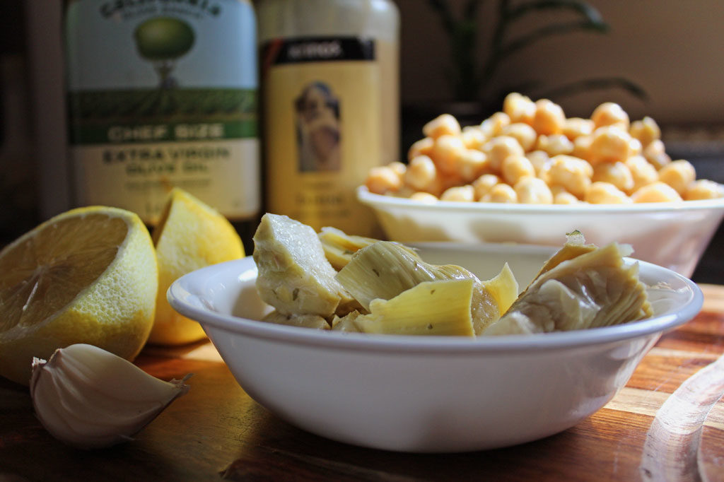 Marinated Artichoke Hummus: The artichokes seem to lighten up the denseness that hummus can have and offers a tanginess that makes it seem lighter. So good! | TheMountainKitchen.com