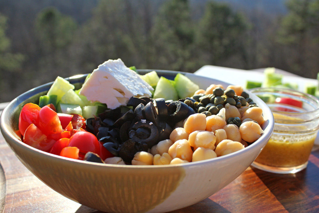 This amazing Greek Chickpea Salad is healthy light and fresh and is loaded with protein packing chickpeas, that will leave you feeling fuller longer. Tasty! | TheMountainKitchen.com