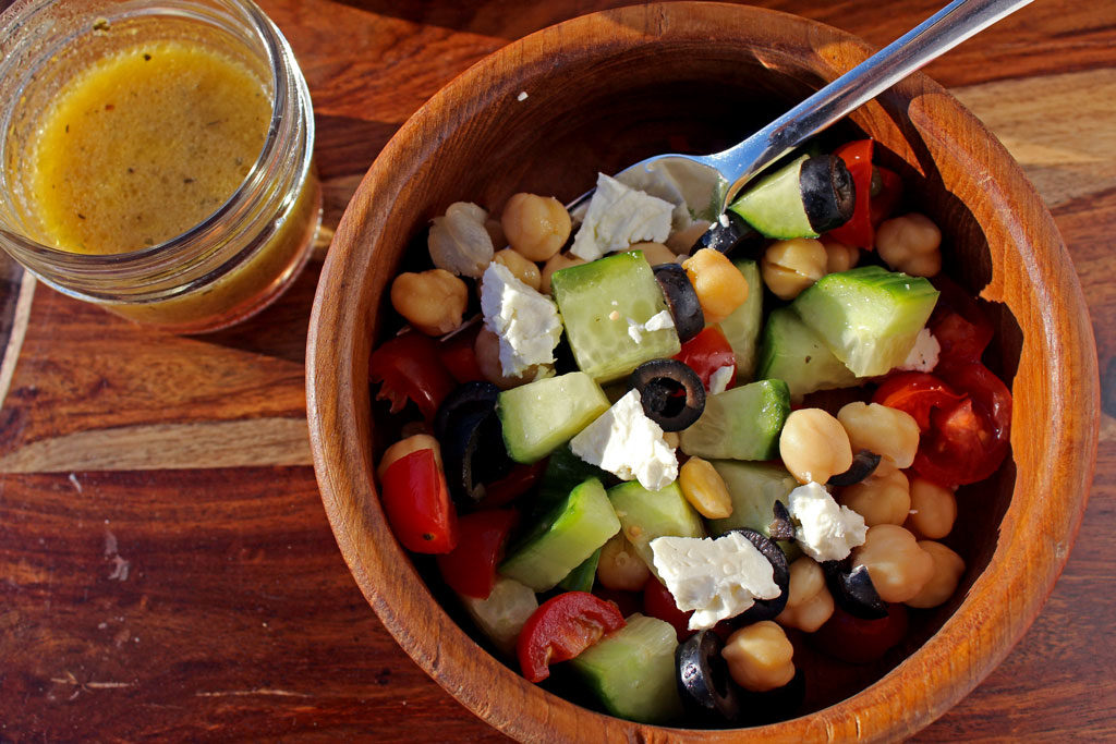 This amazing Greek Chickpea Salad is healthy light and fresh and is loaded with protein packing chickpeas, that will leave you feeling fuller longer. Tasty! | TheMountainKitchen.com